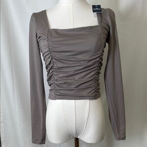 NWT. Hollister Tan Ruched Long Sleeve Cropped Blouse. Size Medium.